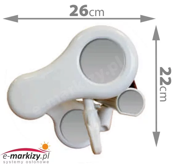 Biały, plastikowy element mechanizmu markizy o obłym kształcie, przedstawiony na jasnym tle. Produkt posiada zintegrowane, okrągłe otwory montażowe z widocznymi szarymi wypełnieniami. Na zdjęciu naniesiono szare strzałki wymiarowe określające gabaryty zewnętrzne elementu: szerokość całkowita wynosi 26 cm, natomiast wysokość całkowita to 22 cm. Konstrukcja wykazuje gładkie wykończenie krawędzi oraz widoczne fragmenty wewnętrznych trzpieni mocujących u dołu i z boku osłony.