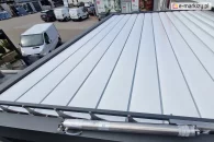 System napędowy mechanizmu przesuwnego umożliwiający tworzenie dachu wodoszczelnego z paneli aluminiowych